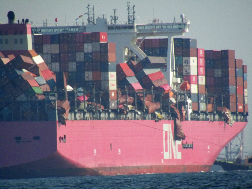 Shipping containers hanging off of the ONE Apus ship